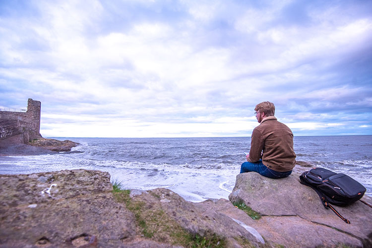 Student looking out to sea