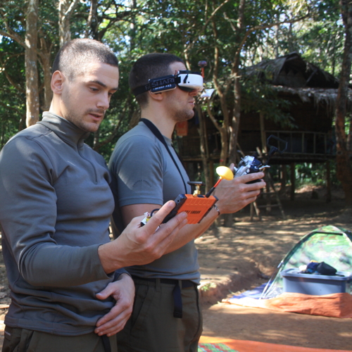 PhD students using a drone in Laos