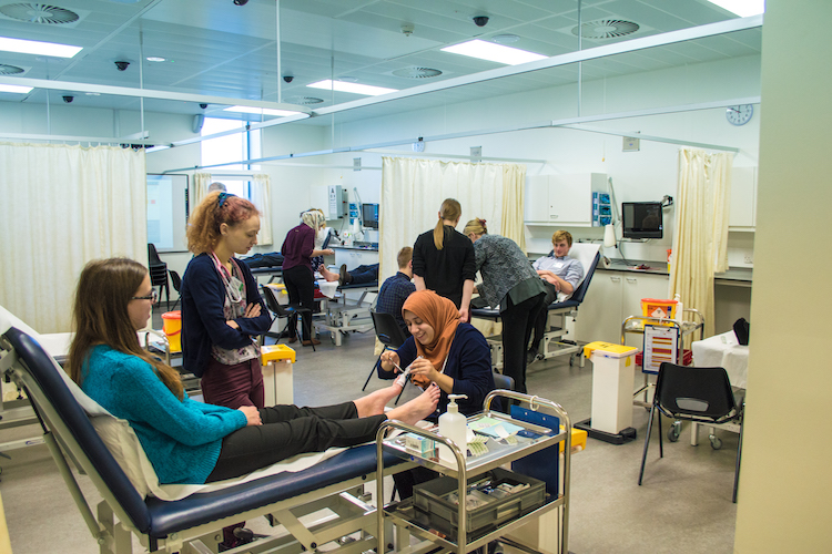 Students practising clinical skills